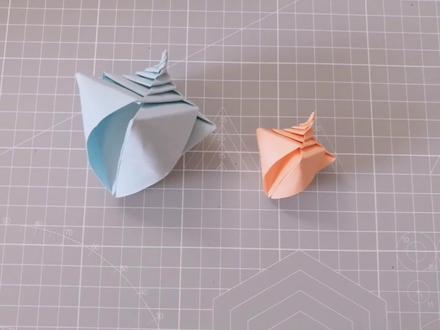 一张纸折成的海螺,折法并不难,你也折一个试试吧!