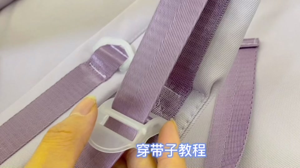 书包卡扣带子怎么系