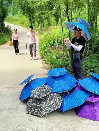 遮阳雨伞帽,既可以防雨又可以防晒,解放双手#伞帽 #头戴式伞帽 #遮阳帽 #遮阳伞
