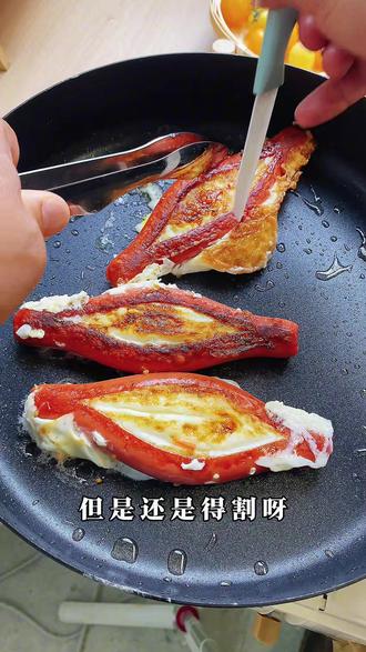 肠包蛋怎么做,蛋清才不流出?#哪位老吃家发明的肠包蛋#鸡蛋的神仙吃法 #肠包蛋 #肠包蛋 #鸡蛋火腿肠