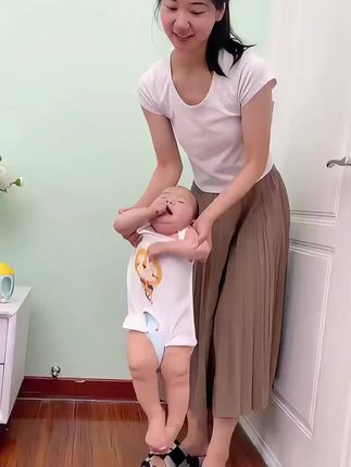 热销翻滚猴子玩具儿童发光小猴子翻跟斗宝宝抬头练习爬行玩具批发